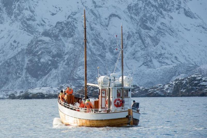 Fishing from a traditional fishing boat in Lofoten. Photo